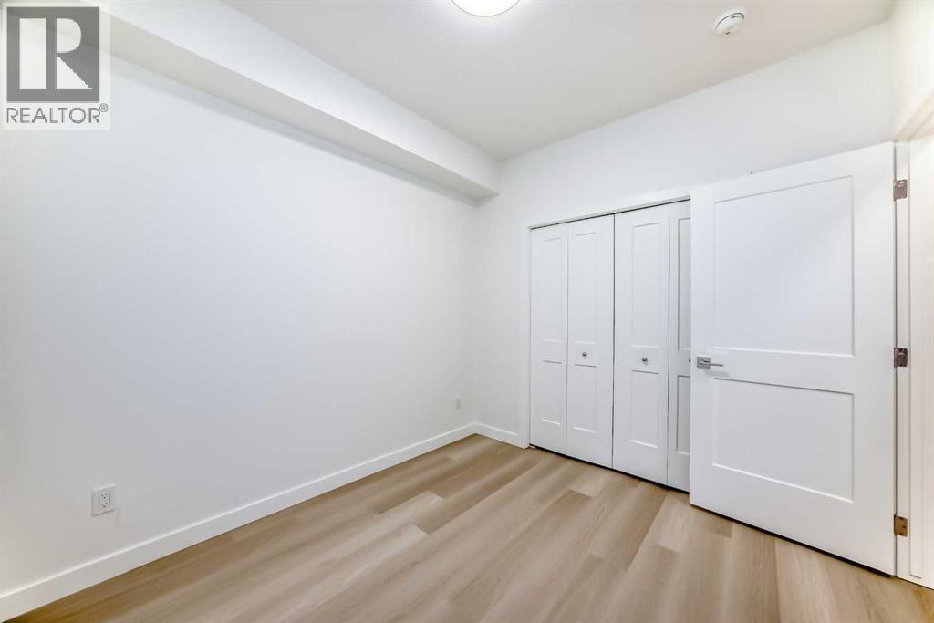7320, 1802 Mahogany Boulevard Se, Calgary, AB - Indoor Photo Showing Other Room