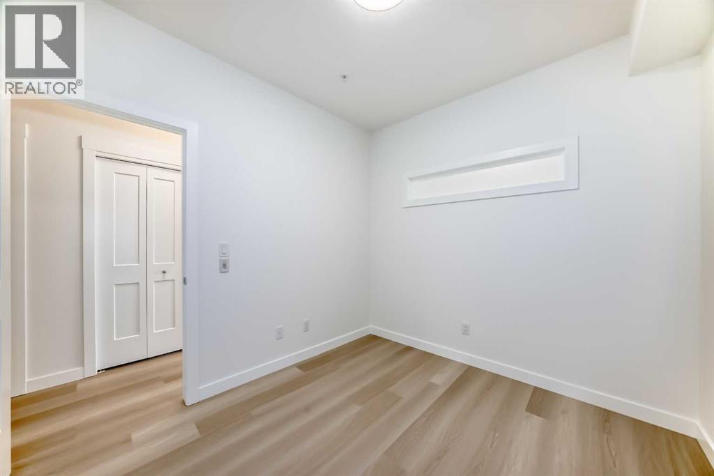 7320, 1802 Mahogany Boulevard Se, Calgary, AB - Indoor Photo Showing Other Room