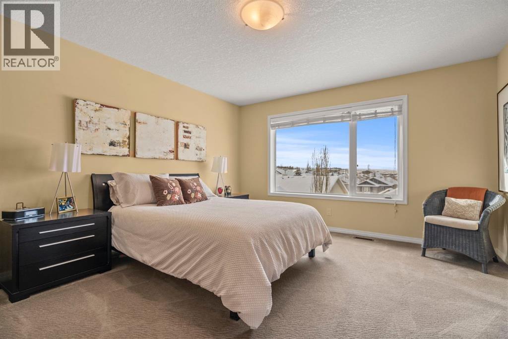 153 Crestridge Way Sw, Calgary, AB - Indoor Photo Showing Bedroom