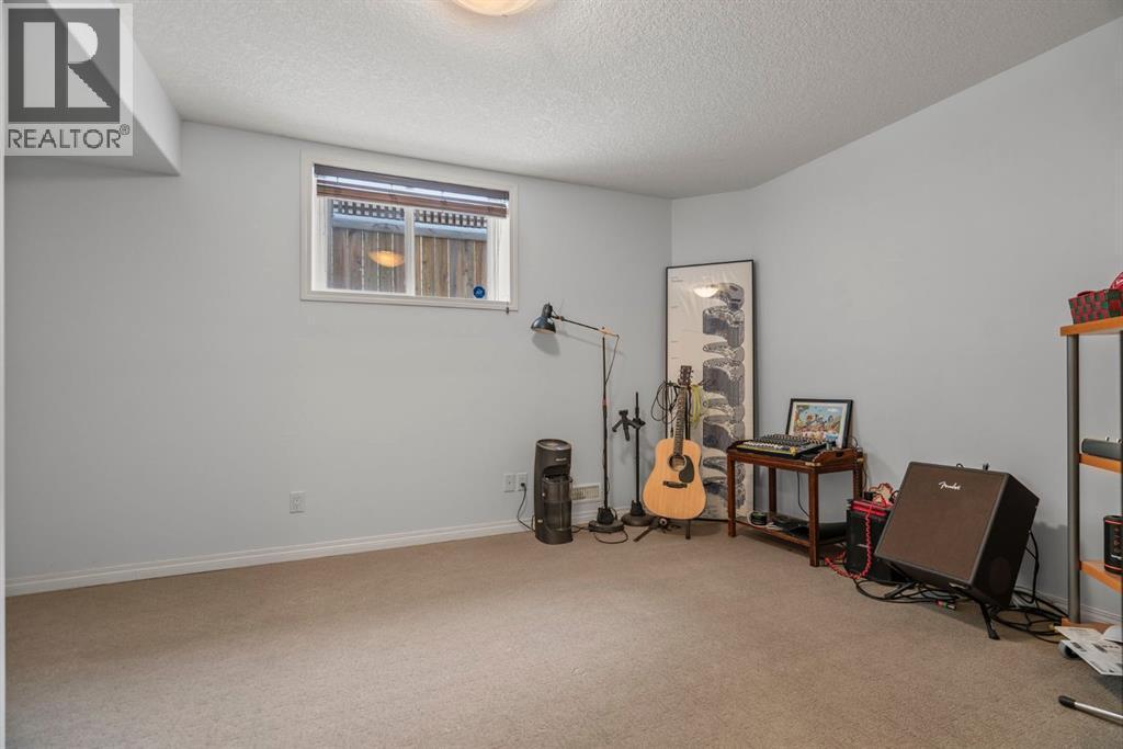 153 Crestridge Way Sw, Calgary, AB - Indoor Photo Showing Other Room