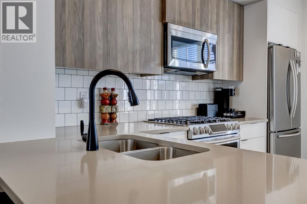 888 Walgrove Boulevard Se, Calgary, AB - Indoor Photo Showing Kitchen With Double Sink With Upgraded Kitchen