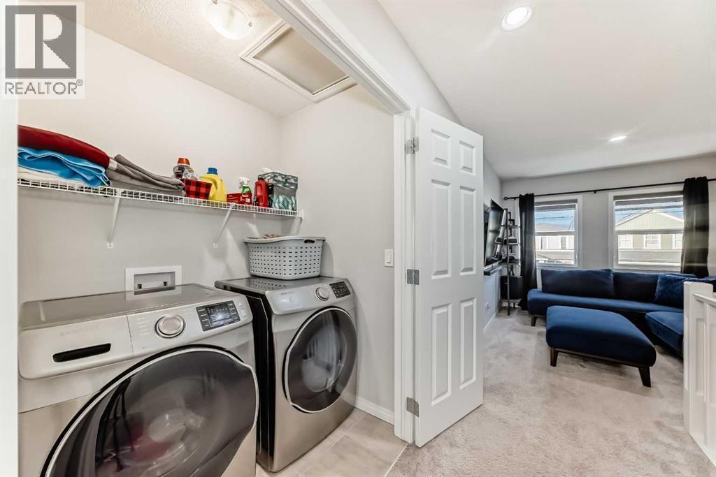 159 Evanscrest Park Nw, Calgary, AB - Indoor Photo Showing Laundry Room
