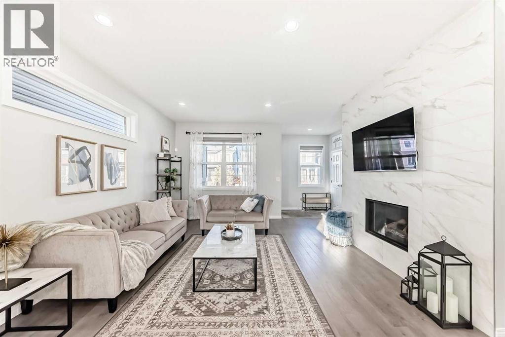 159 Evanscrest Park Nw, Calgary, AB - Indoor Photo Showing Living Room With Fireplace