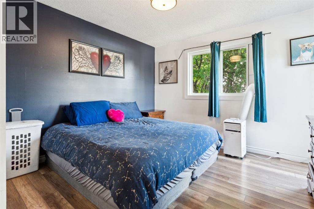 Primary Bedroom - 147 Falchurch Crescent Ne, Calgary, AB - Indoor Photo Showing Bedroom