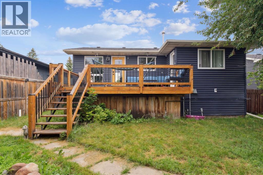 Backyard - 147 Falchurch Crescent Ne, Calgary, AB - Outdoor With Deck Patio Veranda