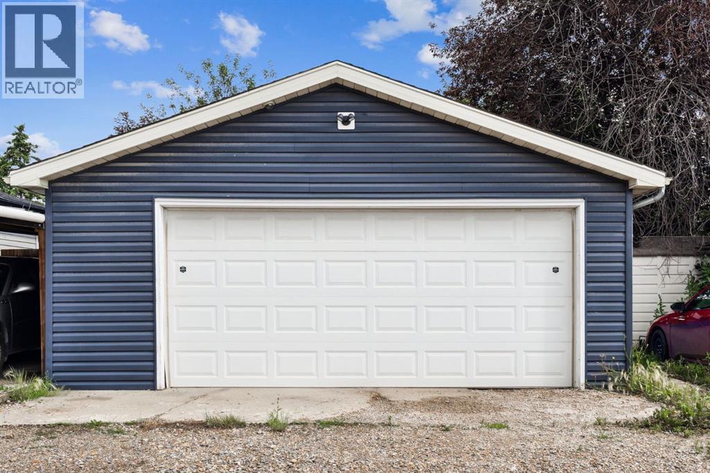 Garage - 147 Falchurch Crescent Ne, Calgary, AB - Outdoor With Exterior