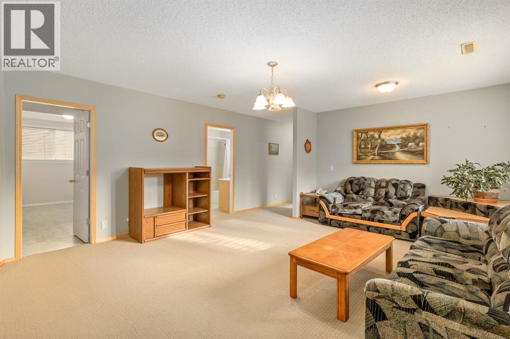 131 Panatella Close Nw, Calgary, AB - Indoor Photo Showing Living Room
