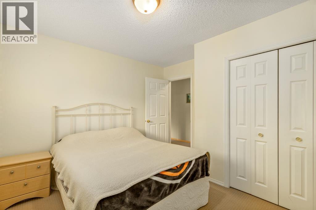 131 Panatella Close Nw, Calgary, AB - Indoor Photo Showing Bedroom
