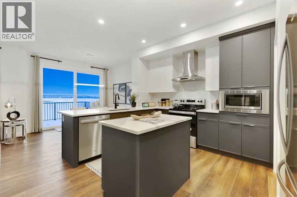 206 Sora Way Se, Calgary, AB - Indoor Photo Showing Kitchen With Stainless Steel Kitchen With Upgraded Kitchen