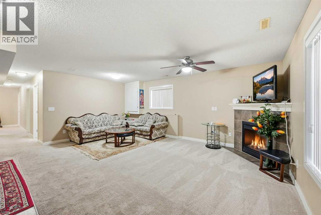 81 Saddlemont Road Ne, Calgary, AB - Indoor With Fireplace