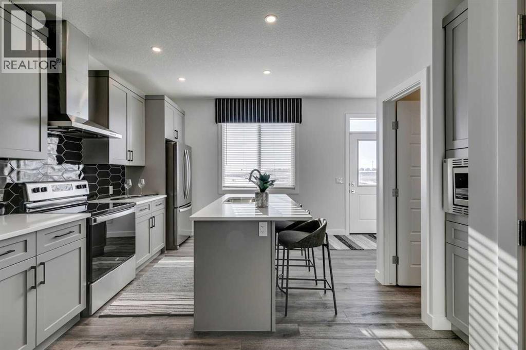 592 Buffaloberry Manor Se, Calgary, AB - Indoor Photo Showing Kitchen