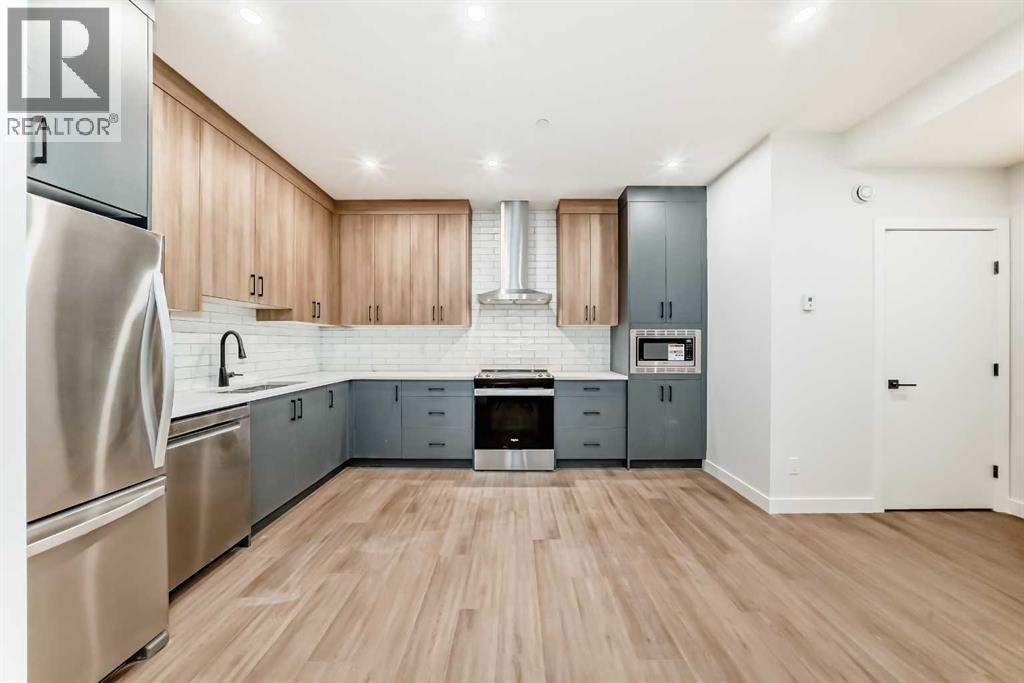 Unit 201B - 1729 31 Street Sw, Calgary, AB - Indoor Photo Showing Kitchen