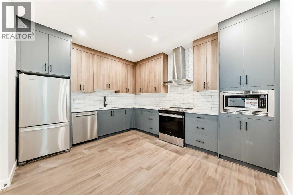 Unit 201B - 1729 31 Street Sw, Calgary, AB - Indoor Photo Showing Kitchen