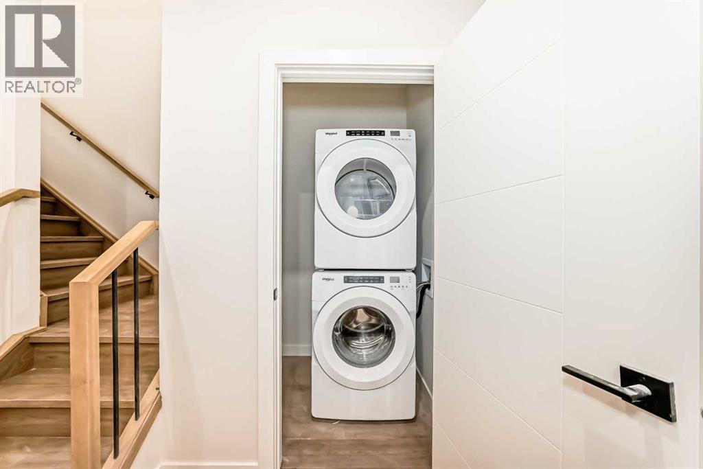 Unit 201B - 1729 31 Street Sw, Calgary, AB - Indoor Photo Showing Laundry Room