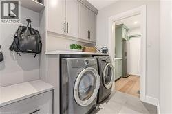 Laundry area with washing machine and dryer and cabinet space -