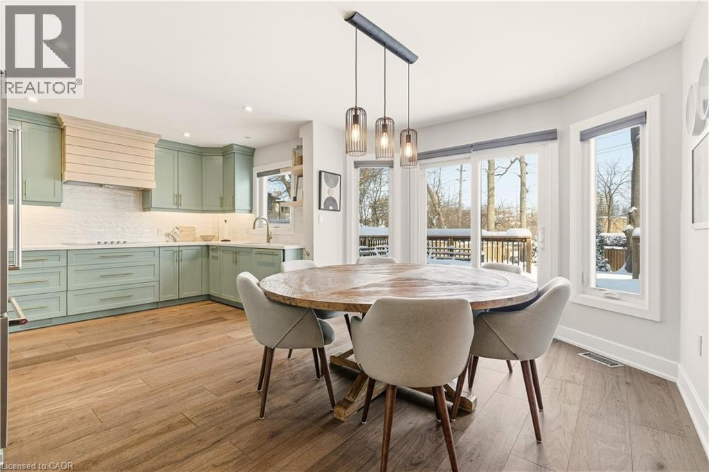 Dining room featuring light wood finished floors and recessed lighting - 697 Lambshead Drive, Burlington, ON - Indoor Photo Showing Dining Room