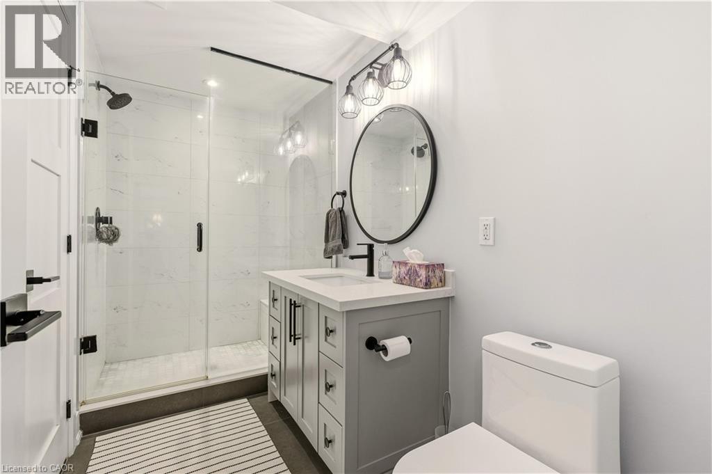Full bath featuring vanity and a stall shower - 697 Lambshead Drive, Burlington, ON - Indoor Photo Showing Bathroom