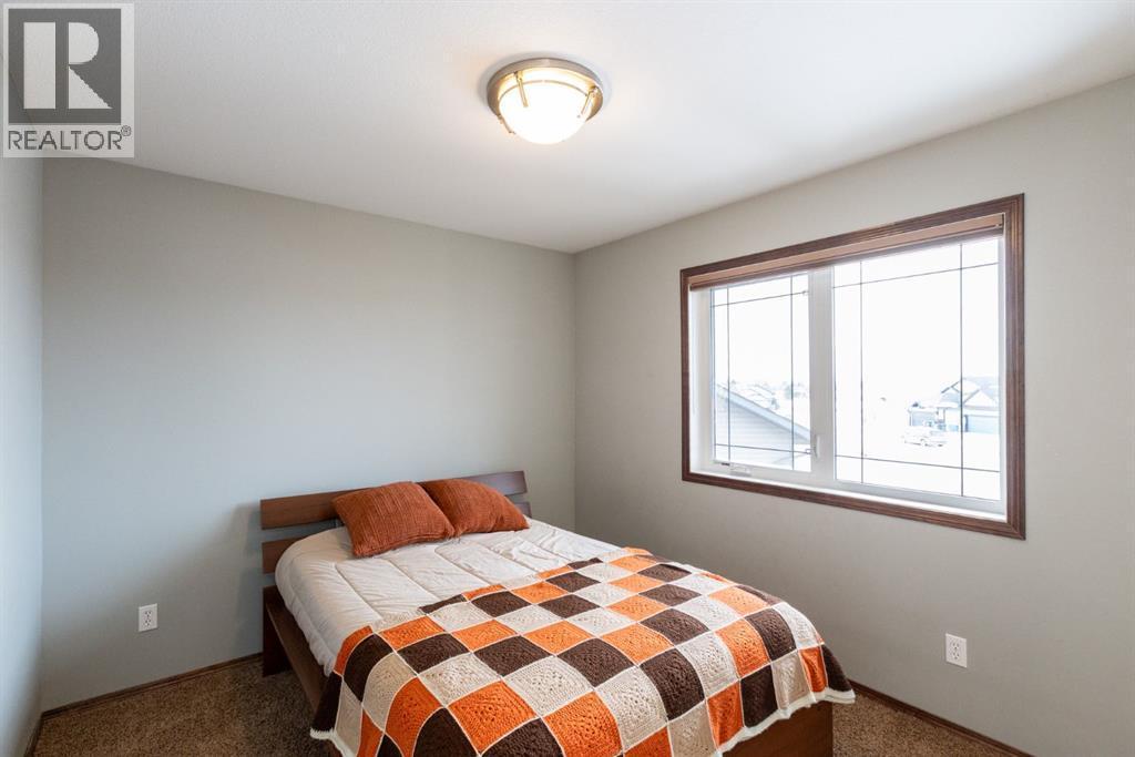 4828 55 Boulevard Close, Innisfail, AB - Indoor Photo Showing Bedroom