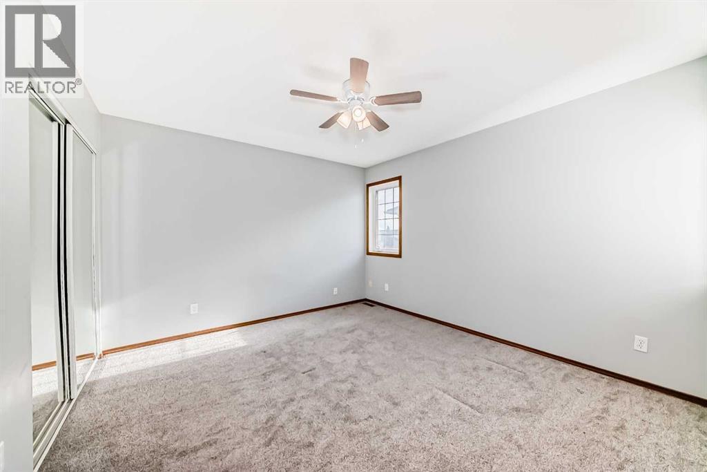 Bedroom 2 - 21 Hillview Road, Strathmore, AB - Indoor Photo Showing Other Room