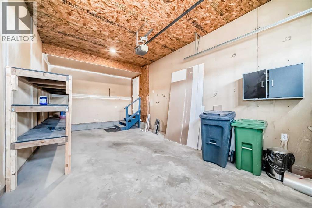 Single attached garage with shelving - 21 Hillview Road, Strathmore, AB - Indoor