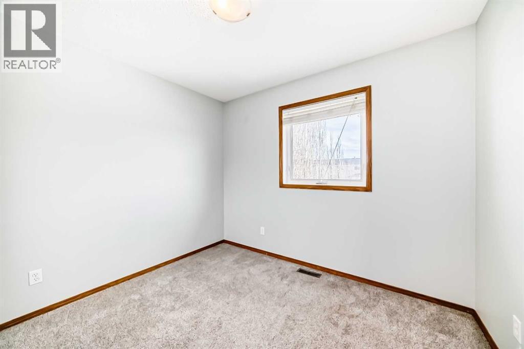 Bedroom 3 - 21 Hillview Road, Strathmore, AB - Indoor Photo Showing Other Room