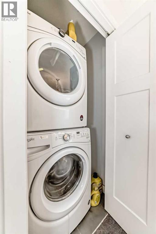 366 Auburn Bay Avenue Se, Calgary, AB - Indoor Photo Showing Laundry Room
