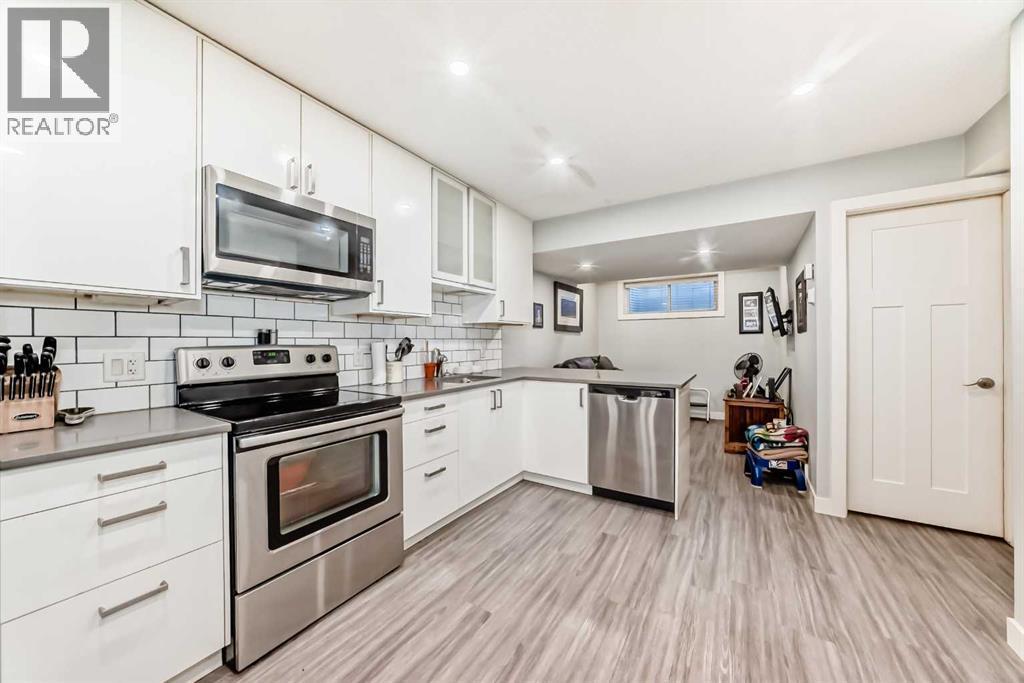 366 Auburn Bay Avenue Se, Calgary, AB - Indoor Photo Showing Kitchen With Upgraded Kitchen