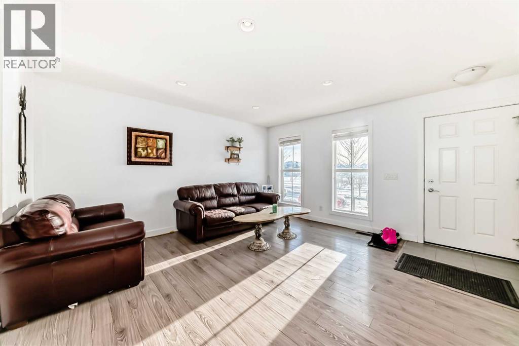 366 Auburn Bay Avenue Se, Calgary, AB - Indoor Photo Showing Living Room