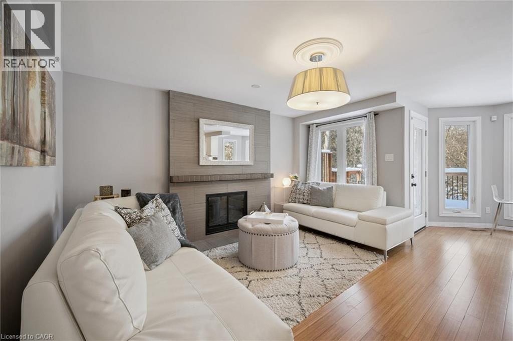 33 Manitoulin Crescent, Kitchener, ON - Indoor Photo Showing Living Room With Fireplace