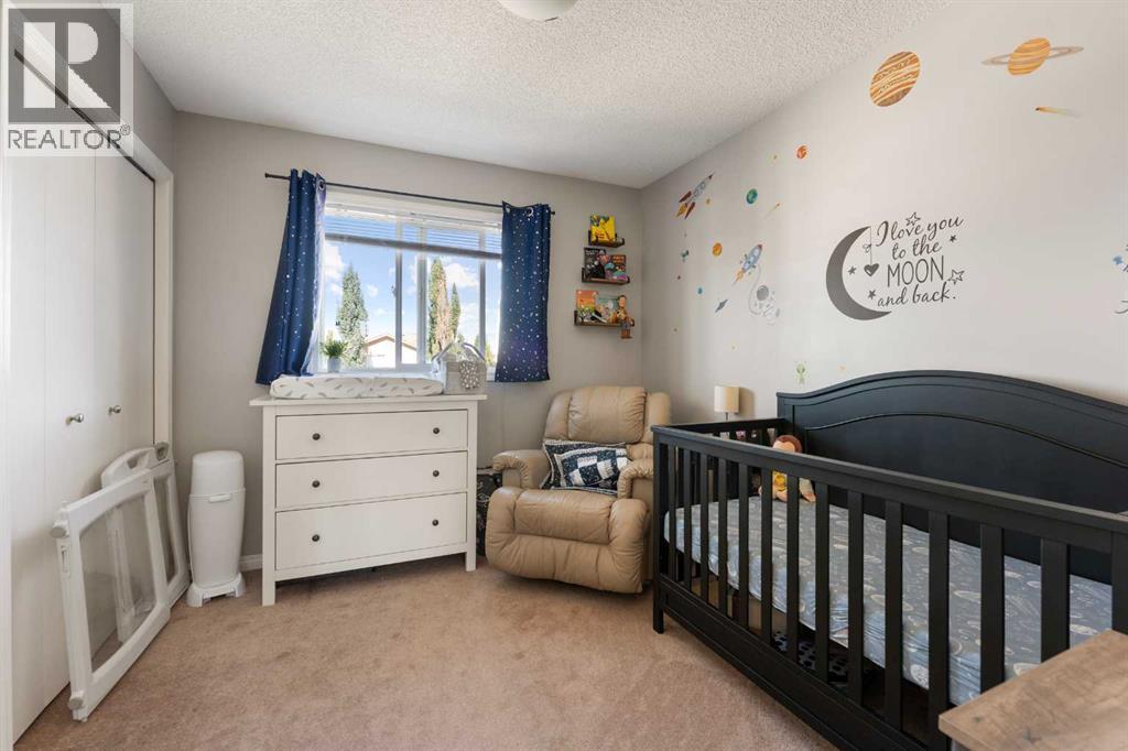 133 Auburn Bay View Se, Calgary, AB - Indoor Photo Showing Bedroom