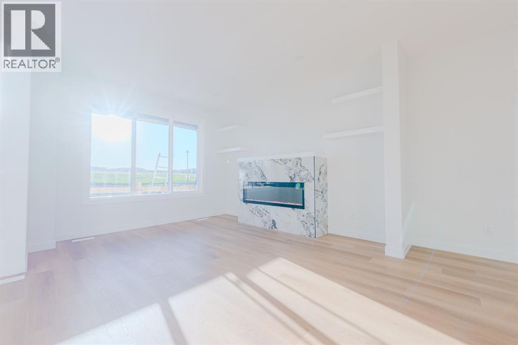 1975 Mccaskill Drive, Crossfield, AB - Indoor With Fireplace