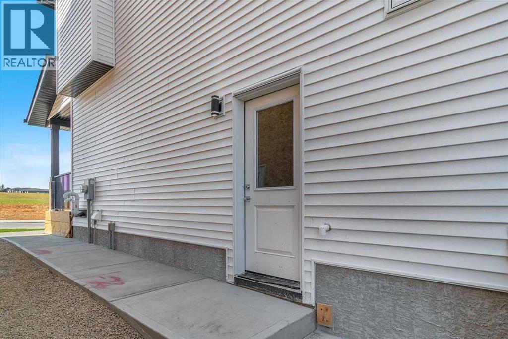 1975 Mccaskill Drive, Crossfield, AB - Outdoor With Exterior