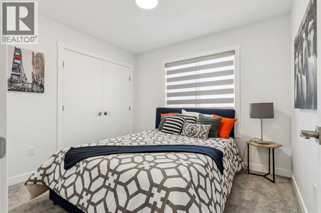 205, 95 Saddlecrest Circle Ne, Calgary, AB - Indoor Photo Showing Bedroom