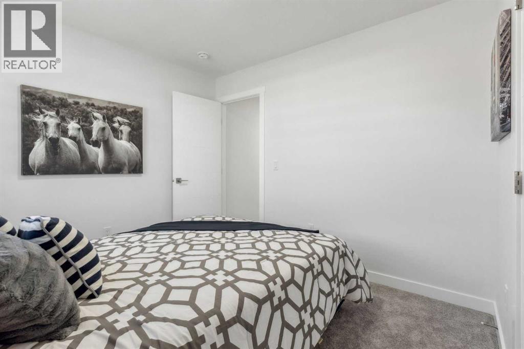 205, 95 Saddlecrest Circle Ne, Calgary, AB - Indoor Photo Showing Bedroom