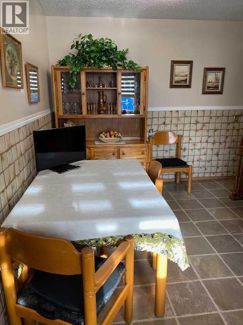 Eat in kitchen - 6311 Pineridge Road Ne, Calgary, AB - Indoor Photo Showing Other Room