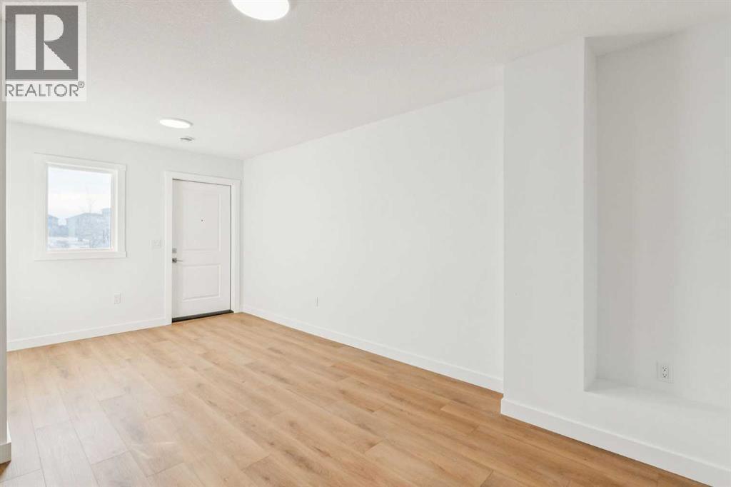 204, 95 Saddlecrest Circle Ne, Calgary, AB - Indoor Photo Showing Other Room
