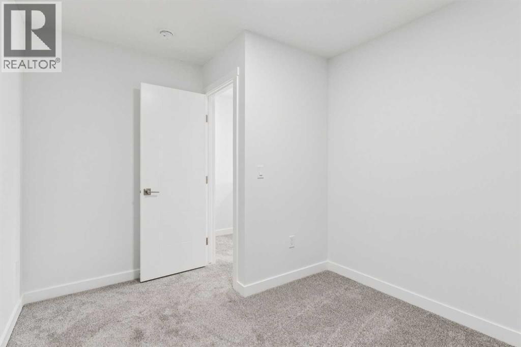 204, 95 Saddlecrest Circle Ne, Calgary, AB - Indoor Photo Showing Other Room