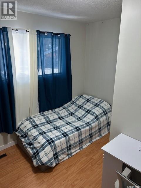 A And B 402 Ash Street E, Saskatoon, SK - Indoor Photo Showing Bedroom