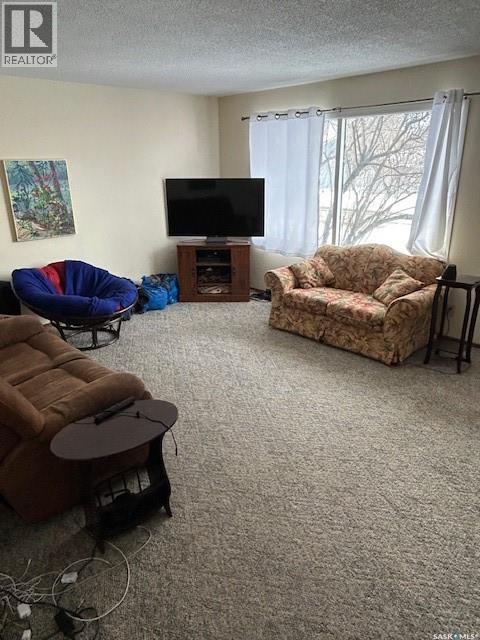 A And B 402 Ash Street E, Saskatoon, SK - Indoor Photo Showing Living Room