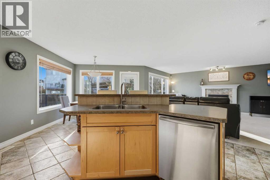 291 Springmere Link Sw, Chestermere, AB - Indoor Photo Showing Kitchen With Double Sink