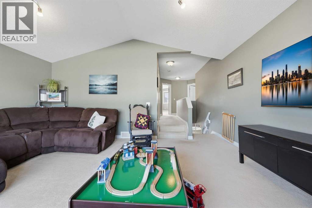 291 Springmere Link Sw, Chestermere, AB - Indoor Photo Showing Living Room