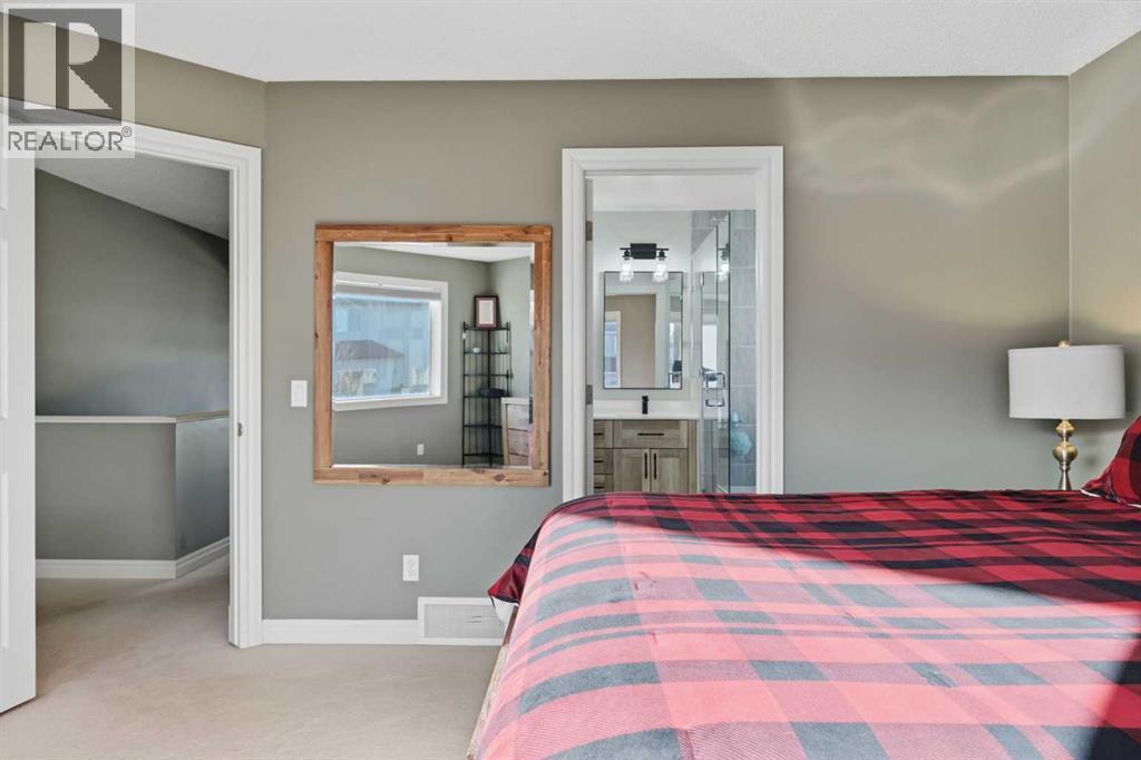 291 Springmere Link Sw, Chestermere, AB - Indoor Photo Showing Bedroom