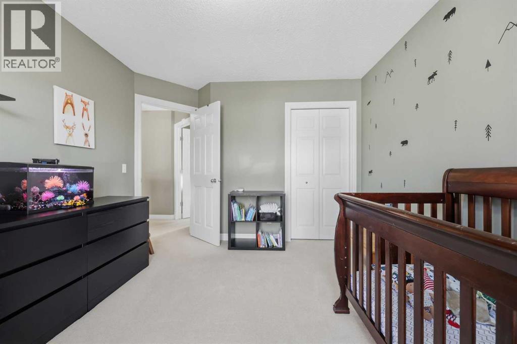 291 Springmere Link Sw, Chestermere, AB - Indoor Photo Showing Bedroom