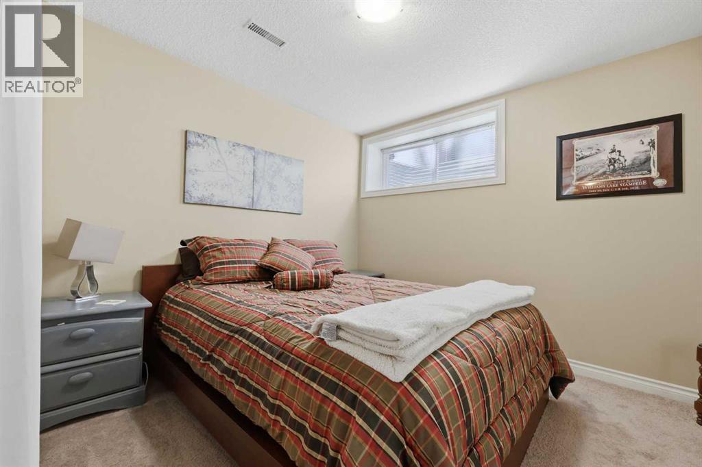 291 Springmere Link Sw, Chestermere, AB - Indoor Photo Showing Bedroom