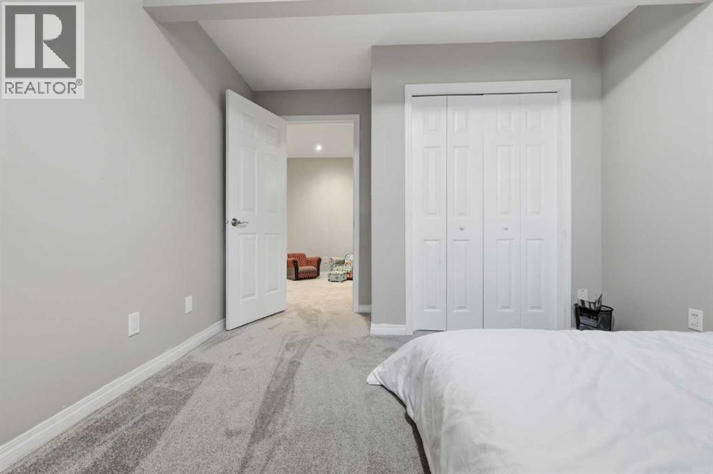 307 Valley Crest Court Nw, Calgary, AB - Indoor Photo Showing Bedroom
