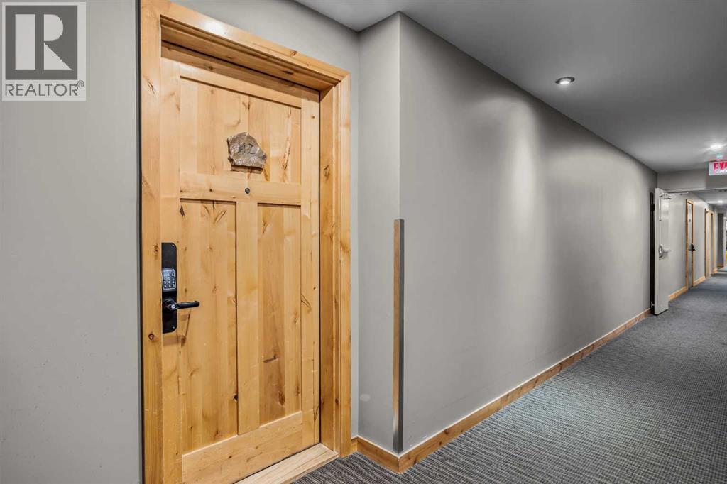 112, 379 Spring Creek Drive, Canmore, AB - Indoor Photo Showing Other Room