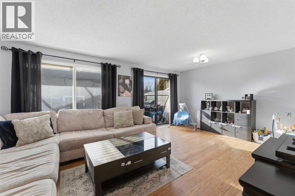 96 Abberfield Crescent Ne, Calgary, AB - Indoor Photo Showing Living Room
