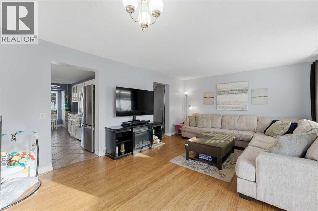 96 Abberfield Crescent Ne, Calgary, AB - Indoor Photo Showing Living Room