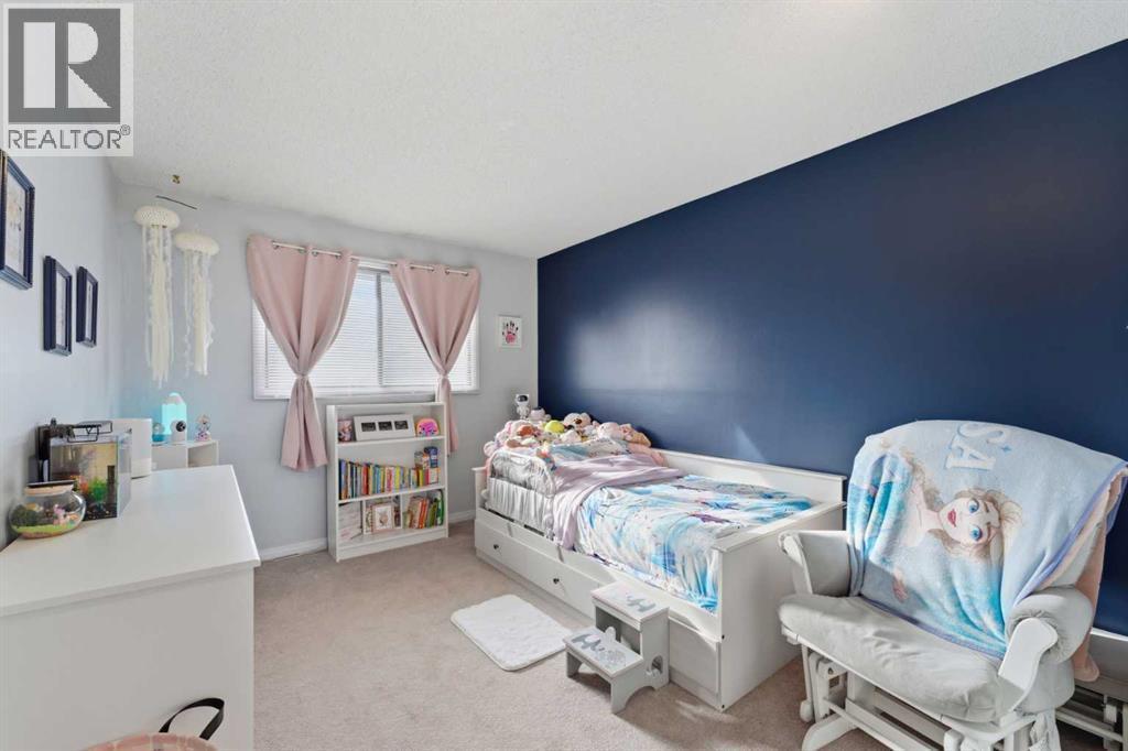 96 Abberfield Crescent Ne, Calgary, AB - Indoor Photo Showing Bedroom