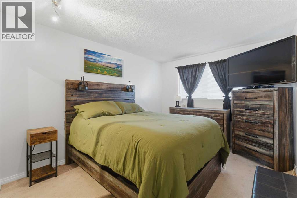96 Abberfield Crescent Ne, Calgary, AB - Indoor Photo Showing Bedroom